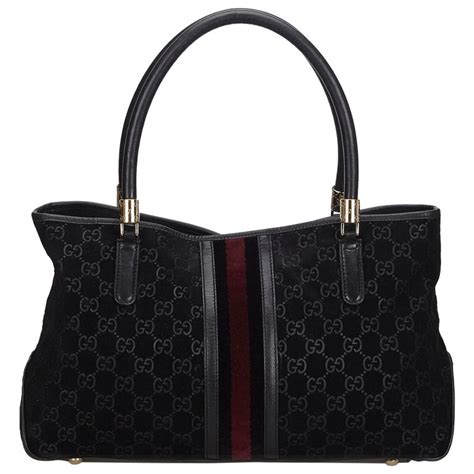 gucci black suede and guccissima|Gucci handbags.